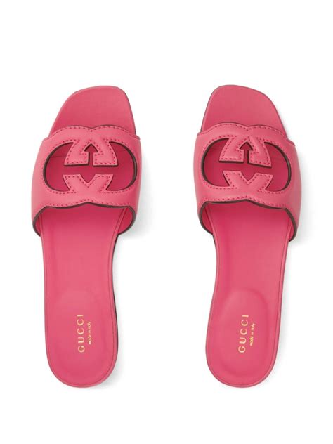 gucci interlocking rubber slides|Gucci rubber pursuit g slides.